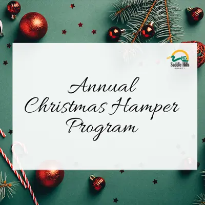 Image of Christmas Decorations with Text 'Annual Christmas Hamper Program'